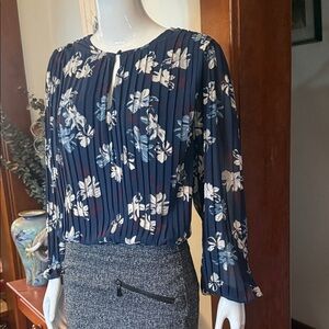 Tiffosi size M like new sheer Floral Navy Blouse. Elastic waist and wrist.
